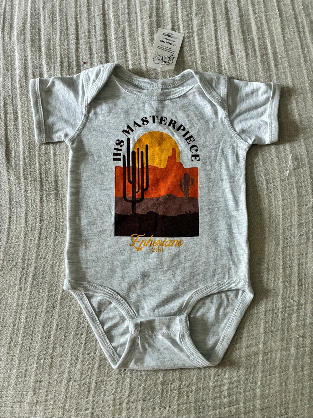 His Masterpiece Ephesians 2:10  Desert Graphic Onesie Heathered Gray, 12 mo NEW!